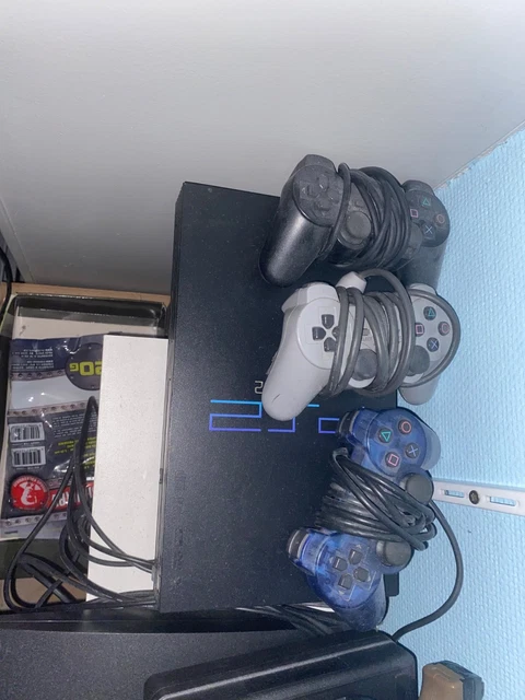 Lot PlayStation 2 : Console Noire + 3 Manettes + 26 Jeux + 3 Cartes Mémoires
