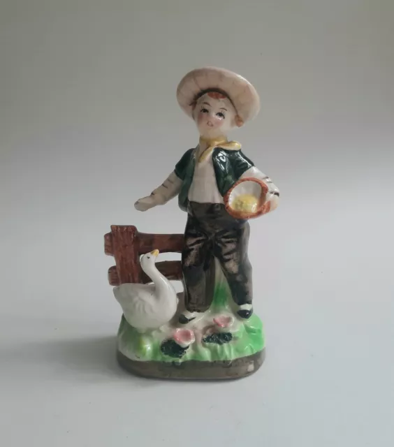 Little Boy with Goose Ceramic Figurine 6"