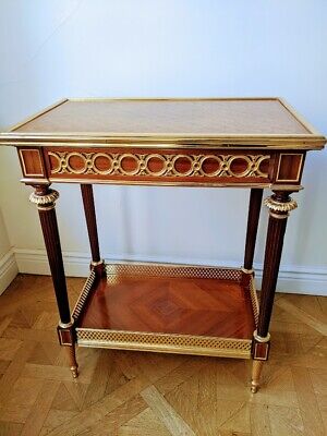 A French 19th Century Louis XVI St. Mahogany, Rosewood, And Ormolu Side Table