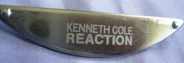 Collectible Vintage Kenneth Cole Reaction Logo 3 1/4"Silver tone metal hook ups
