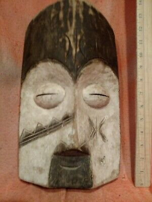 Large Mask with White Colorant Details — Authentic Carved African Wood Art