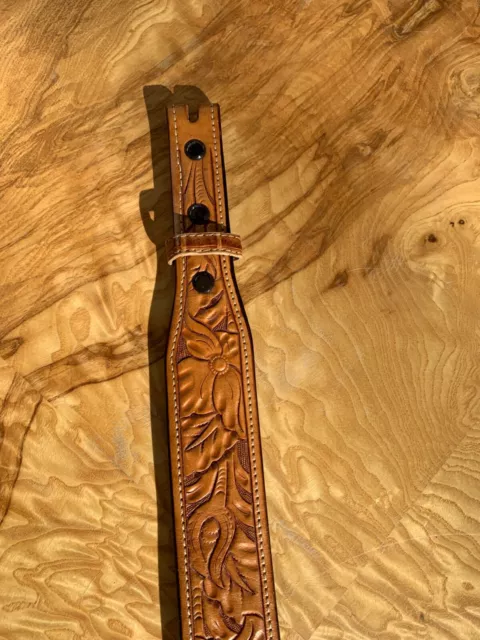 M.L. Leddy's fully hand tooled western leather belt size 30. Retails at $250 3