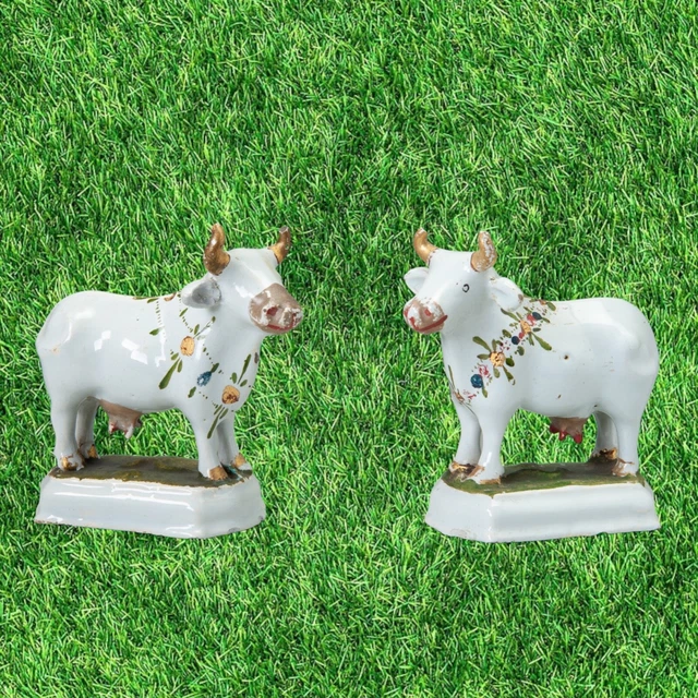 Nice pair of  small Dutch Delft white cows , 18th century.