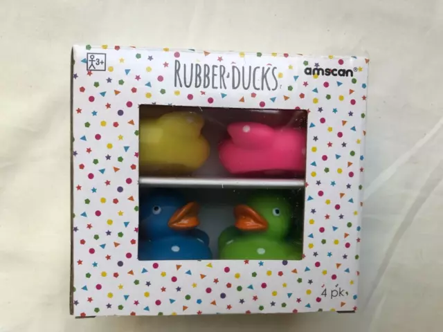 4 rubber squeaky ducks