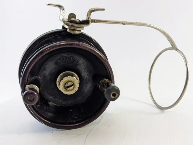 MOULINET ANCIEN ALPHA à embase tournante en bakélite made in Australia