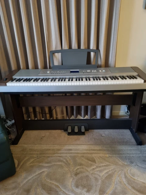 Yamaha DGX 640 portable Grand Piano, stand and extra foot pedal.