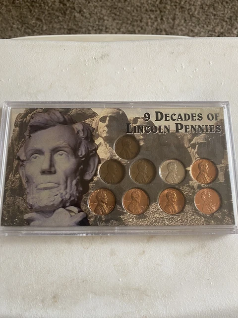 9 Decades Of Pennies in holder. pretty cool set of pennies