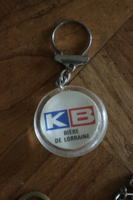 Porte-clefs publicitaire ancien FRANCE SOIR