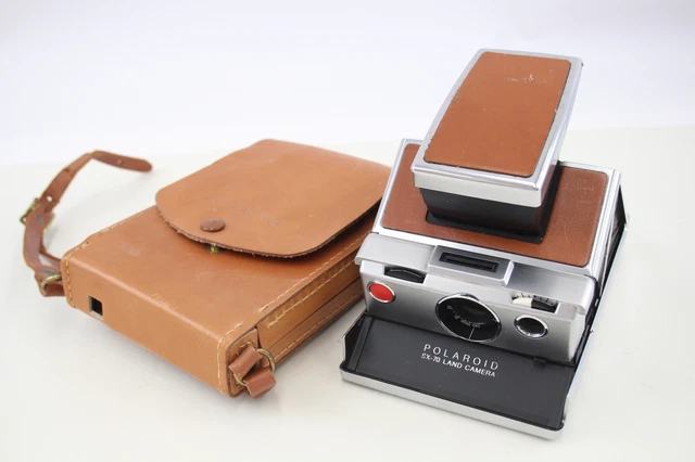 Cámara terrestre Polaroid gris y negra foto - Imagen de Gris gratuita