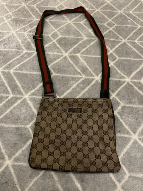 Gucci messenger bag with sales red and green strap