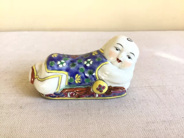 Vintage Chinese Export Porcelain Enamel Laying Child On Opium Pillow Figurine