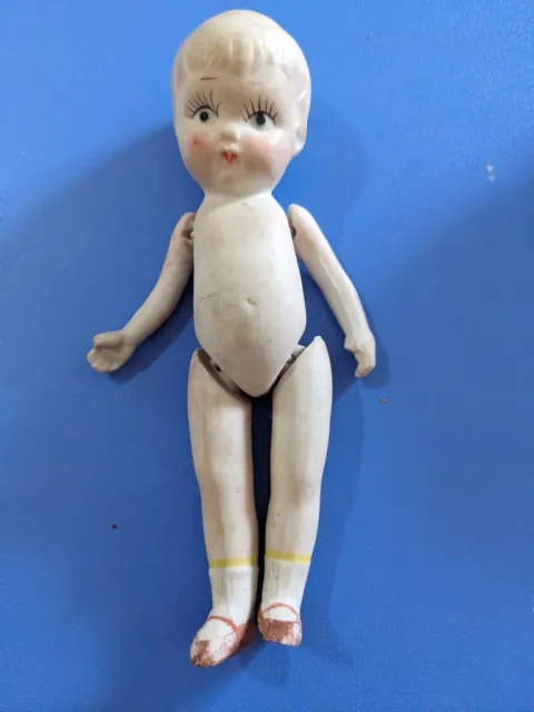 Vintage Bisque Porcelain  7" Doll Made In Japan C332 arms and legs are jointed.