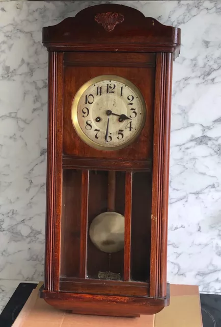 20th C - Wall Mounted Clock - Wooden Case - Key & Pendulum - Needs Cleaning