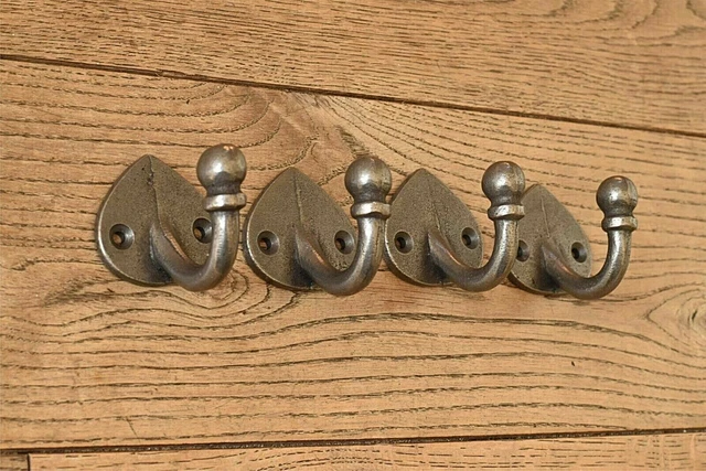 Four lovely arts and crafts style cast iron single coathook hook hanger MF1