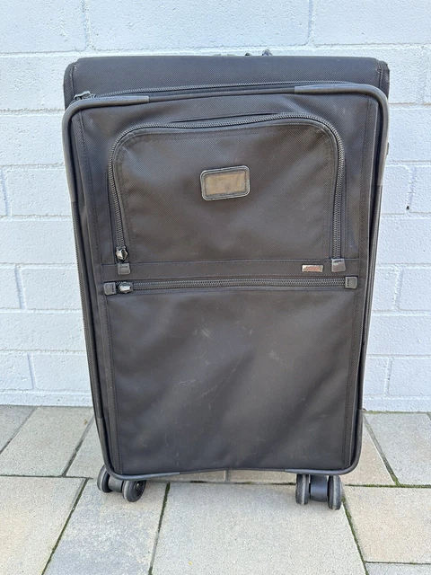 Tumi expandable 4 wheeled large suitcase packing case for extended travel
