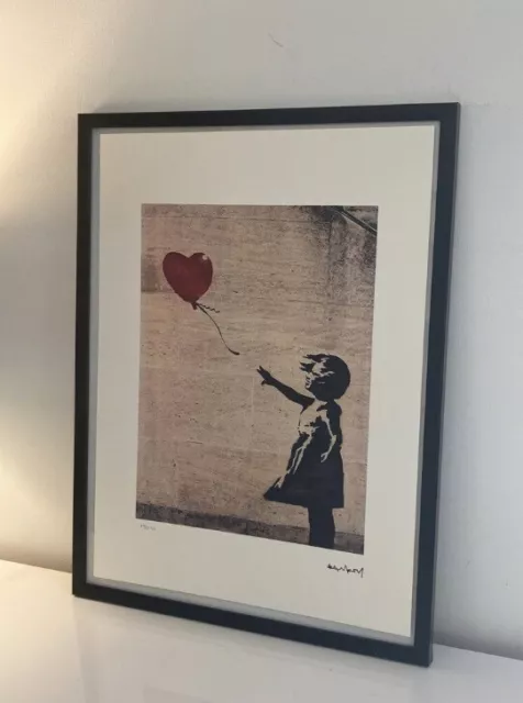 lithographie banksy avec certificat et encadrée