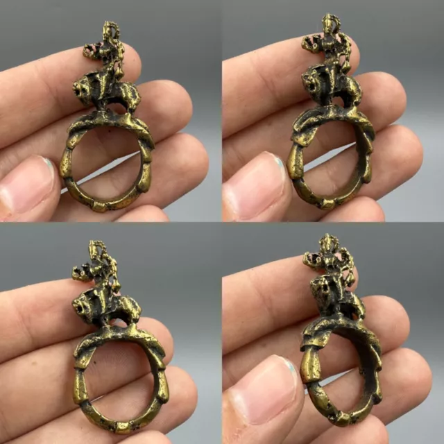 Old rare ancient Roman bronze ring with men on top of animal