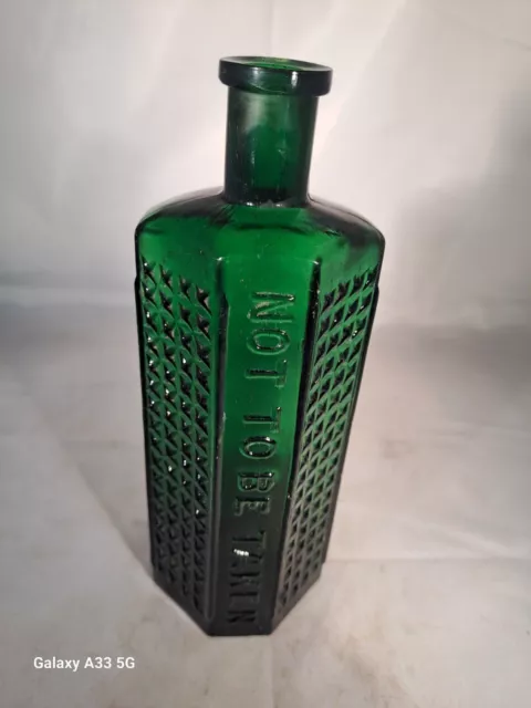 8oz Emerald Green NTBT Flatback Poison Bottle c1910