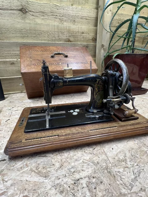 Antique sewing machine Faudels of London inlayed case & Key .