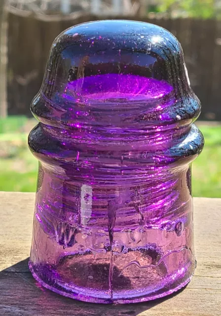 CD 121 W.G.M. Co. Deep Purple Toll Glass Insulator