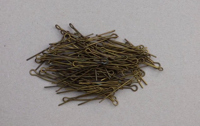 100 Assorted brass badge pins