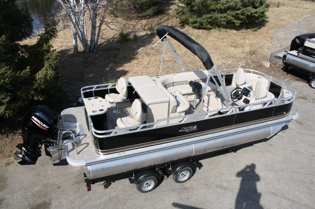 Triple tube New 20  fish and fun pontoon boat-150 four stroke and trailer