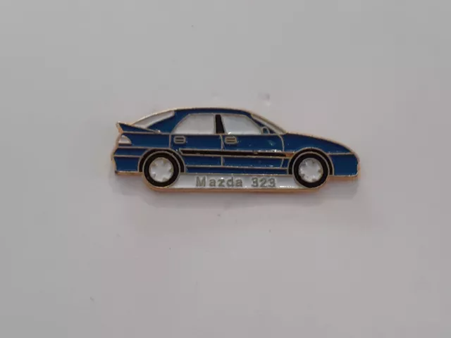 pins mazda 323