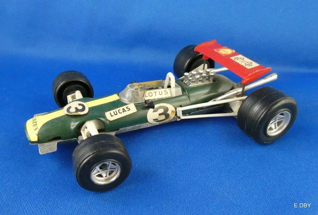 Carrera Universal 40402 - Lotus 25 Climax F1 Rouge Bandes Bleues N°3 1962 sans Boite 1/32 1