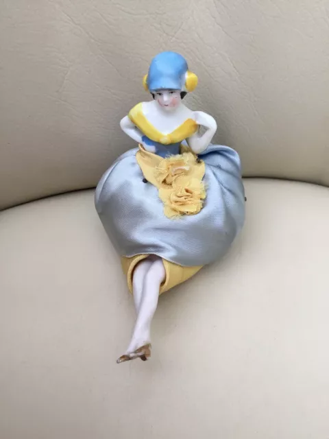 ANTIQUE VINTAGE PORCELAIN HALF DOLL PIN CUSHION WITH LEGS 9 cm High