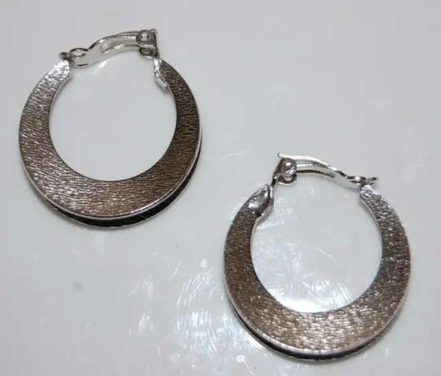 Elegant Lewis Segal Textured Silver Toned Metal Hoops Statement Clip-On Earrings