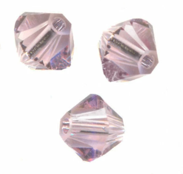 site parisien..20 PERLES TOUPIES SWAROVSKI   5mm   LIGHT AMETHYST.