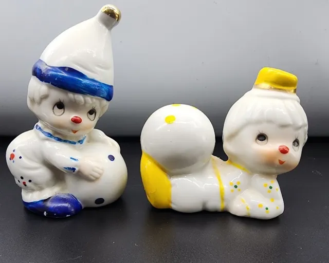 Vintage pair of playful children porcelain figurines dress as clowns Taiwan
