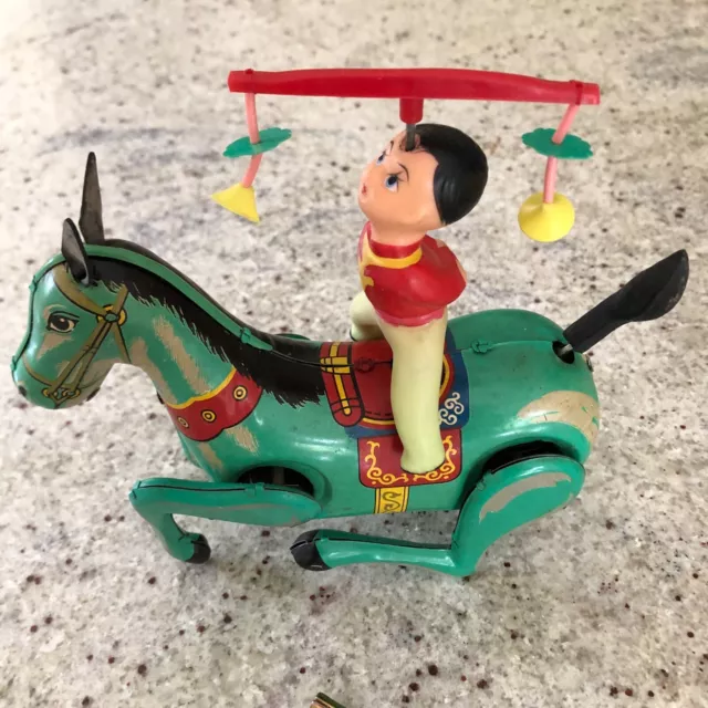 VINTAGE 1960's CLOCKWORK ACROBAT ON HORSE -MS749- TIN WIND UP TOY-AS PER PHOTOS