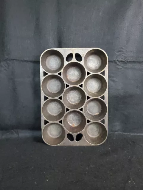 https://www.picclickimg.com/ev8AAOSwf4hlZOlE/Vintage-GRISWOLD-Cast-Iron-No-10-Popover-Muffin.webp