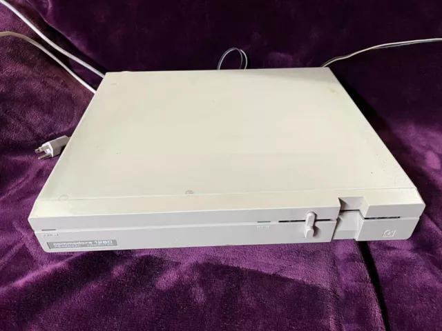 Commodore 128D in metal case with manual, mouse