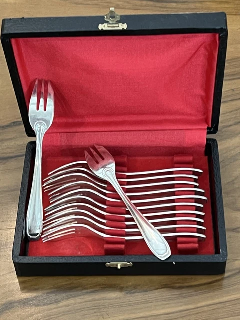 SERIE DE 12 FOURCHETTES A GATEAU EN METAL ARGENTE Argenté Métal - Vendu