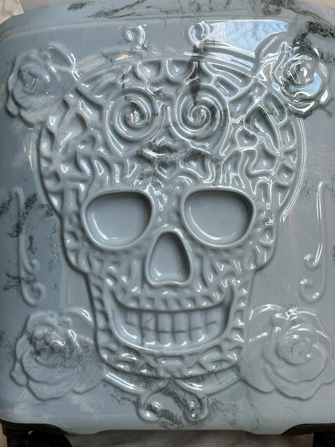 It luggage sales skull embossed