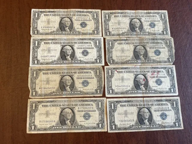 1957  silver certificate EIGHT One dollar blue  Seal One Star Note
