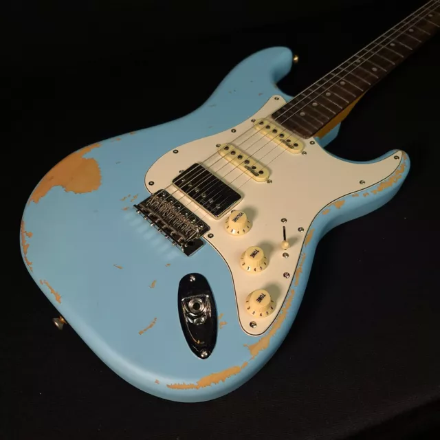 Vintage V6HMRLB HSS Icon Aged Relic Electric Guitar Gloss Laguna Blue Vintage V6HMRLB HSS Icon Aged Relic Electric Guitar Gloss Laguna Blue