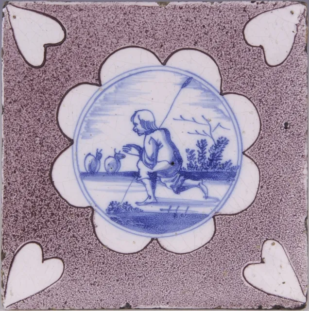 Nice Dutch Delft manganese and blue tile, shepherd and sheep, 18th century.