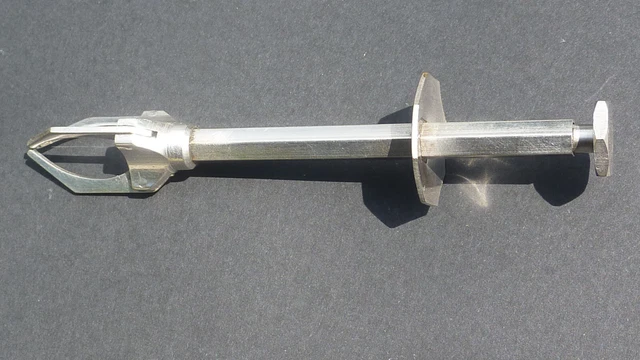 Pince à sucre ou à glaçons en métal argenté