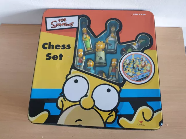 The Simpsons chess set in a tin