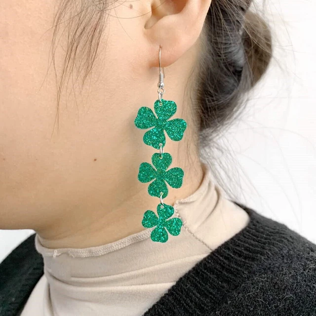 Clover store dangle earrings