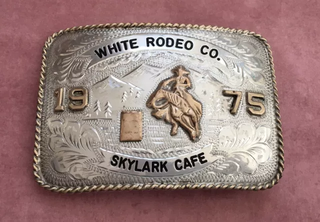 1975 White Rodeo Co Skylark Cafe R & R Hand Engraved Bi Met Vintage Belt Buckle