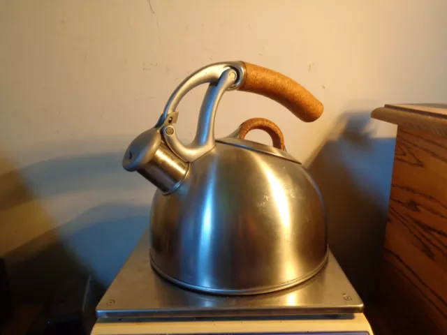 OXO Uplift Brushed Stainless Whistling Tea Kettle With Cork Handles and lid.