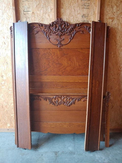 Carved wooden bed