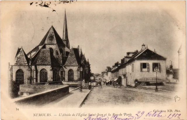 CPA AK NEMOURS - L'Apse de l'Église St-JEAN et la Rue de PARIS (436936)