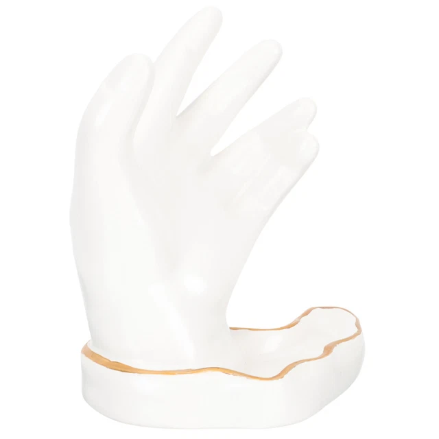 Soporte de porcelana blanca niño escultura nasal soporte de teléfono de mesa blanco