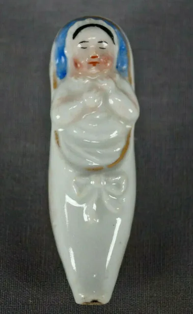 19th Century German Hand Painted & Gilt Baby in Shoe Figural Porcelain Whistle