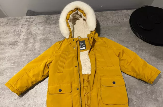 George mustard coat top